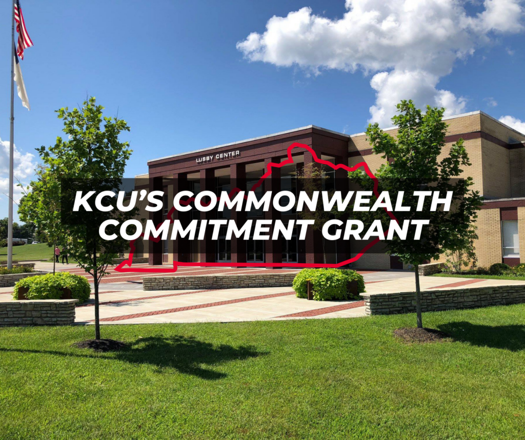 Image of the exterior of the Lusby Center building, with text overlay: "KCU's Commonwealth Commitment Grant" in bold white letters, and the outline of Kentucky in red behind the text.